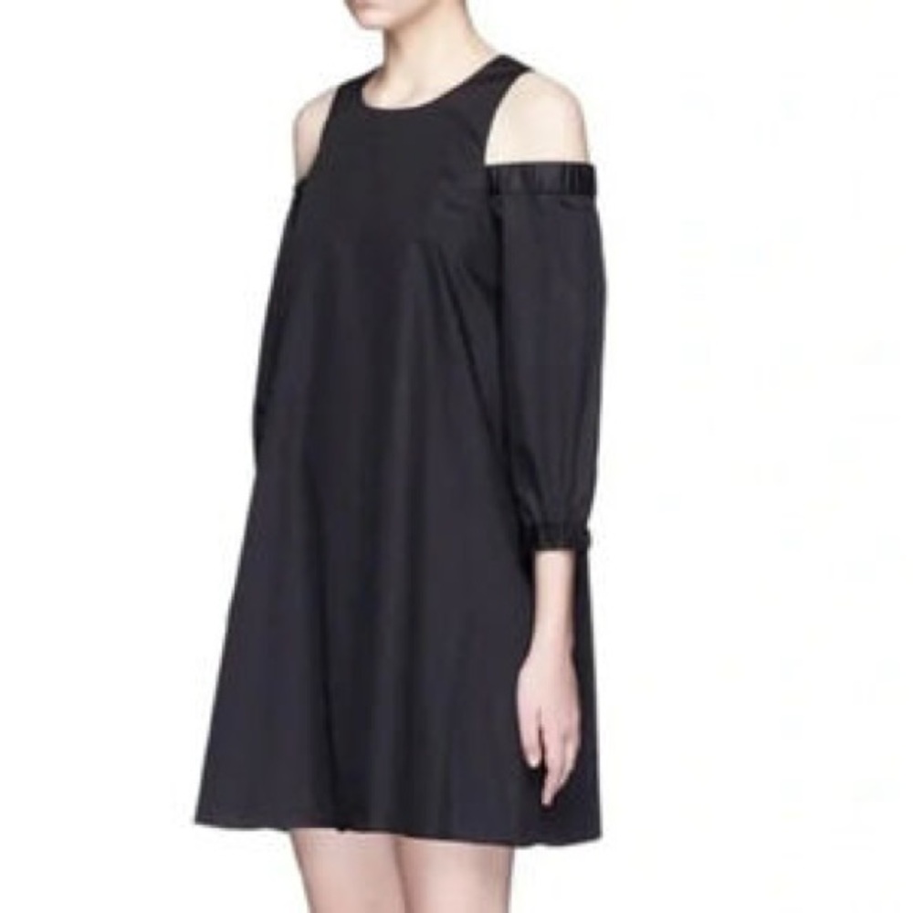 Tibi size 12 Elegant Black scoop Neck Top with cold shoulder sleeves
